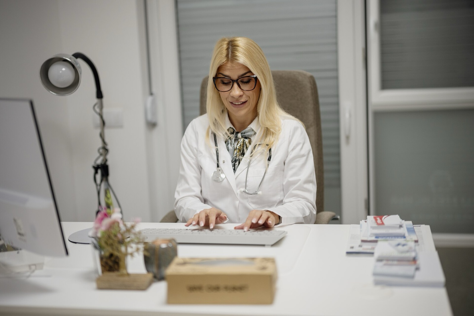 A provider at her desk during a video consultation